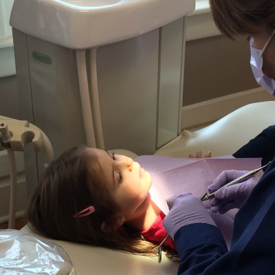 Dr. Erin Brown Treating Young Girl